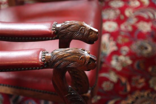 A set of six mid 19th century Anglo Indian carved padouk elbow chairs, W.2ft H.3ft 1in.